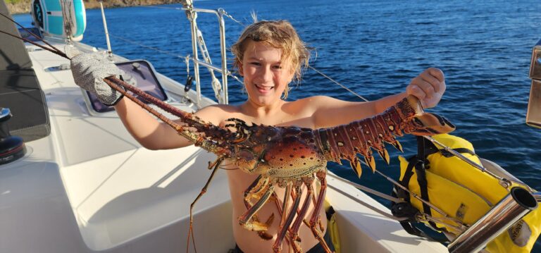 Gabriel holding a lobster